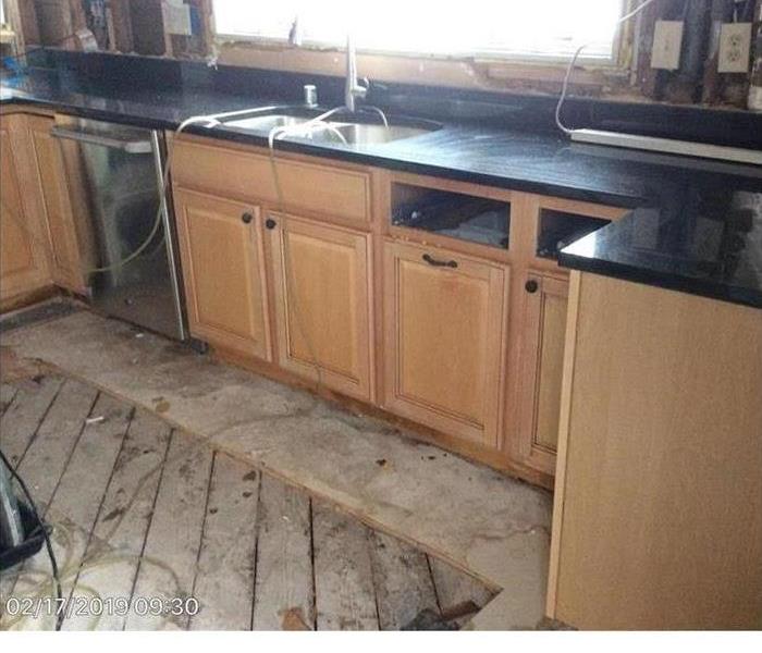 kitchen with exposed floor 