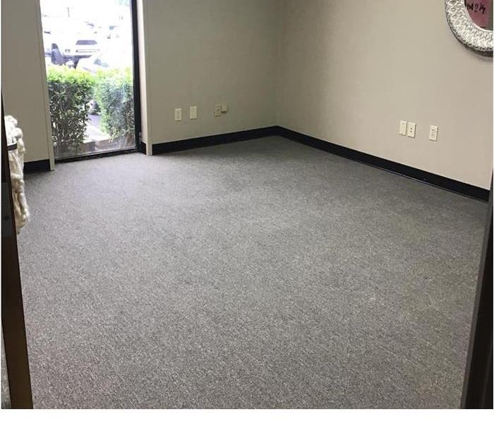 a carpeted office in a commercial building