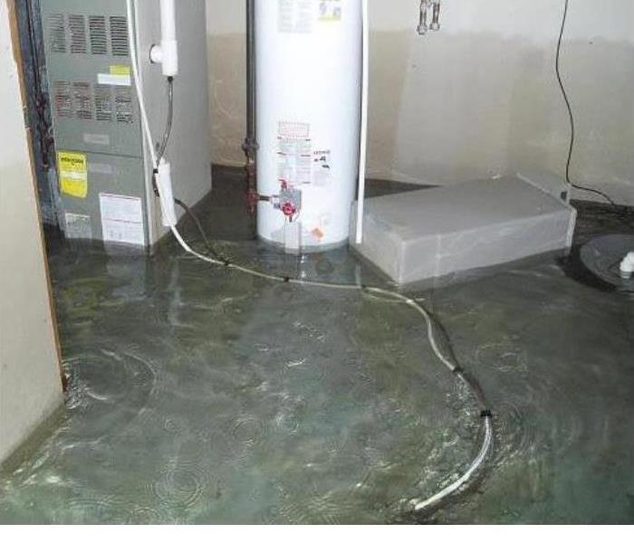 water filled basement from a broken water heater 