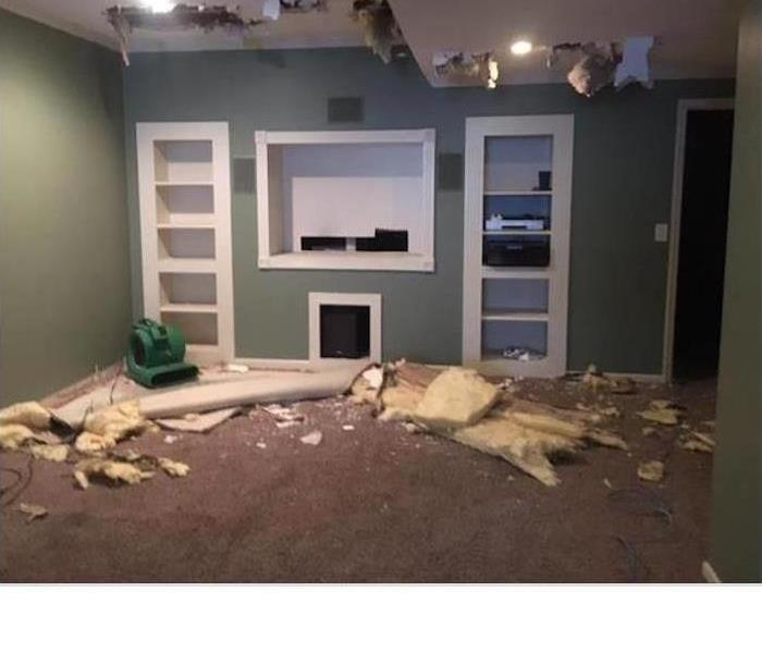 Room with ceiling caved in