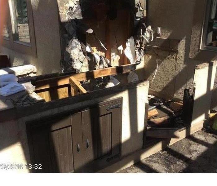fire damaged outdoor kitchen